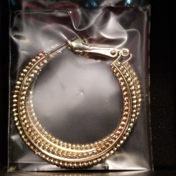 Avon's Goldtone Hoop And Stud Earring Set - Picture 3 of 5